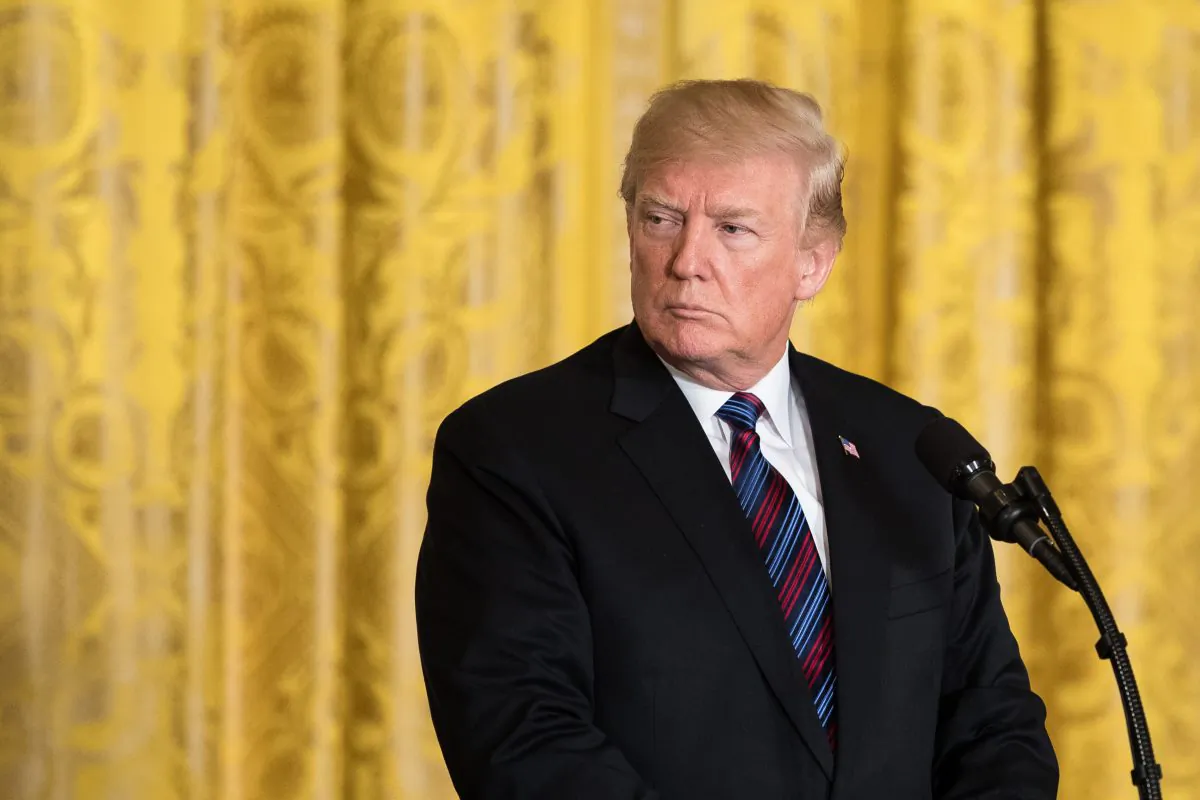 President Donald Trump signals that the United States will guard its interests as it holds those accountable for the killing of Jamal Khashoggi, a U.S. resident, who was killed in a Saudi consulate in Istanbul, Turkey, in October. (Samira Bouaou/The Epoch Times)