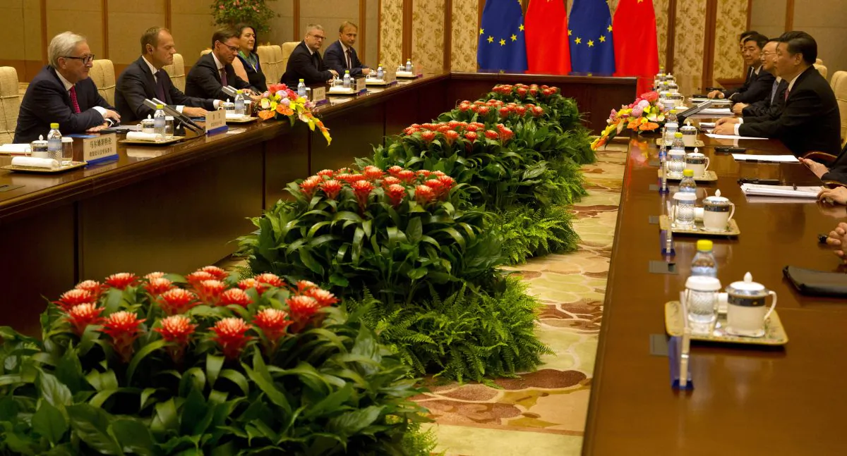Chinese leader Xi Jinping (R) meets with European Commission President Jean-Claude Juncker (L) and European Council President Donald Tusk (2nd L) during a meeting at the Diaoyutai State Guesthouse in Beijing on July 16, 2018. (Ng Han Guan/AFP/Getty Images)