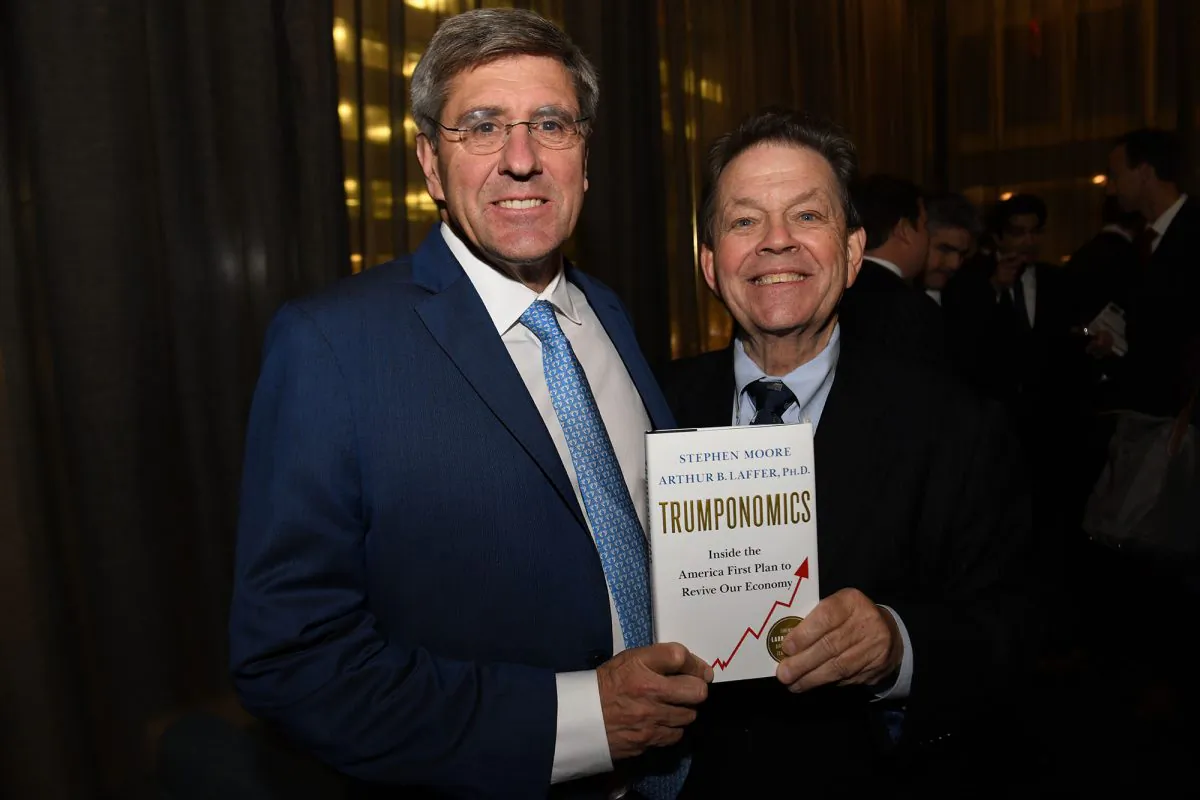 Author Stephen Moore (left) at the Trumponomics book launch on Oct. 29 in the Four Seasons Restaurant in New York City. (Jillian Nelson)