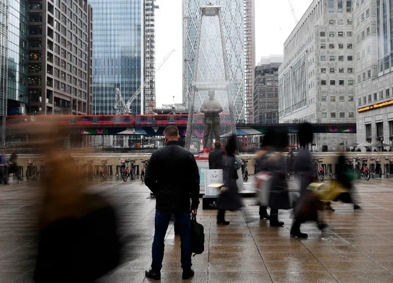 People walk past a temporary sculpture installed to mark the centenary of the Armistice which ended the First World War, in the Canary Wharf financial district of London, Britain on Nov. 1, 2018. (Toby Melville/Reuters)