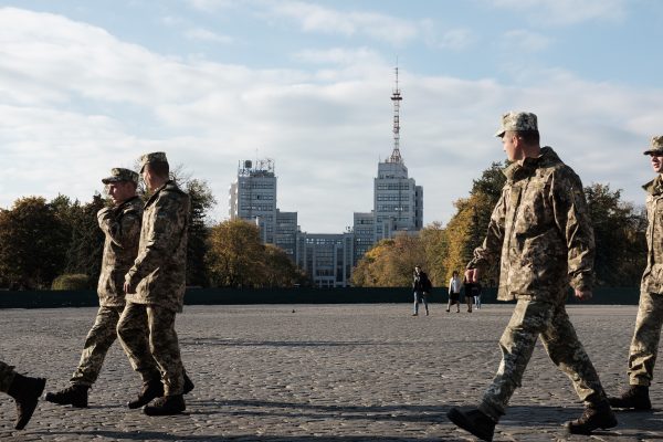 Ukrainian soldiers walk through the central square of Kharkiv ahead of Defender of Ukraine Day in October.