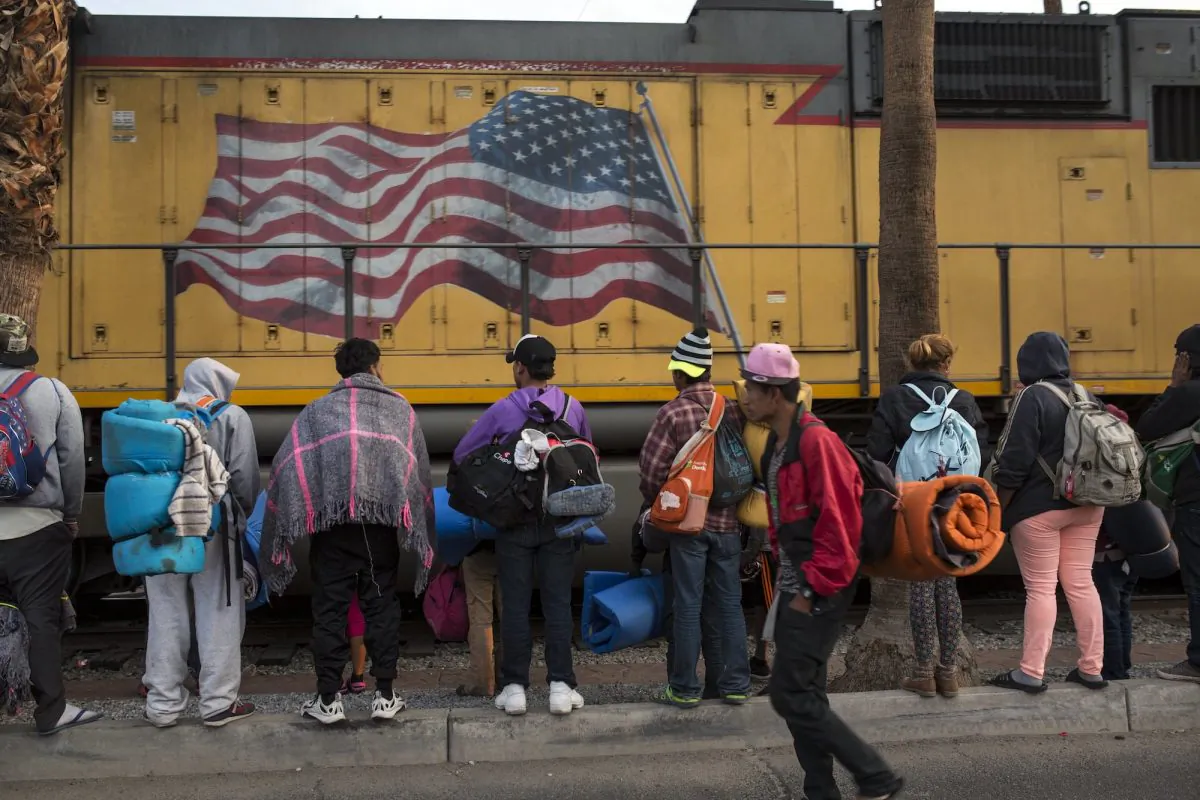 Central American migrants, part of the Central American caravan trying to reach the United States, continue their journey as they prepare to leave Mexicali, Mexico, on Nov. 20, 2018. (Rodrigo Abd/AP Photo)