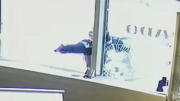 suspect brandishes a handgun