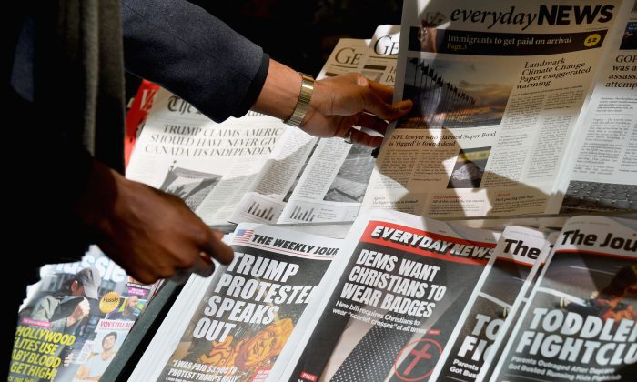 A misinformation newsstand set up by the Columbia Journalism Review is seen in midtown Manhattan on Oct. 30, 2018, aiming to educate news consumers about the dangers of disinformation, or fake news, in the lead-up to the U.S. midterm elections.     (Angela Weiss/AFP/Getty Images)