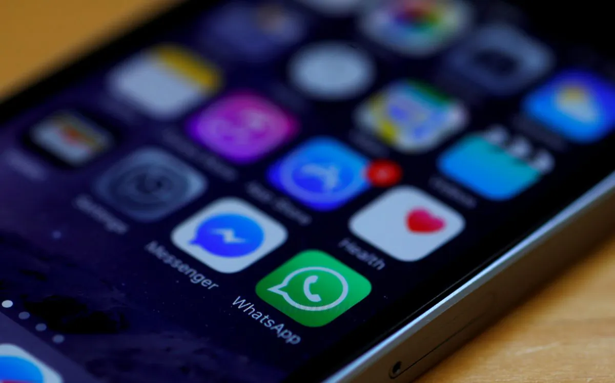 WhatsApp and Facebook messenger icons are seen on an iPhone in Manchester, Britain, on March 27, 2017.  (Phil Noble/Reuters)