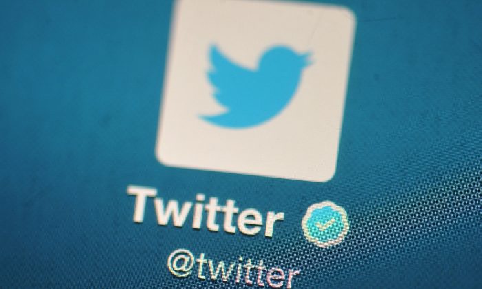 A file photo of the Twitter logo displayed on a mobile device in London, England, on Nov. 7, 2013. (Bethany Clarke/Getty Images)