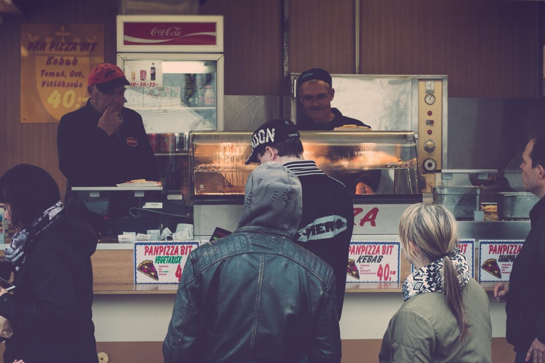The isolation of eating out alone will likely mean lesser quality food, and a lack of human connection. (Stefan Barkman/Unsplash)