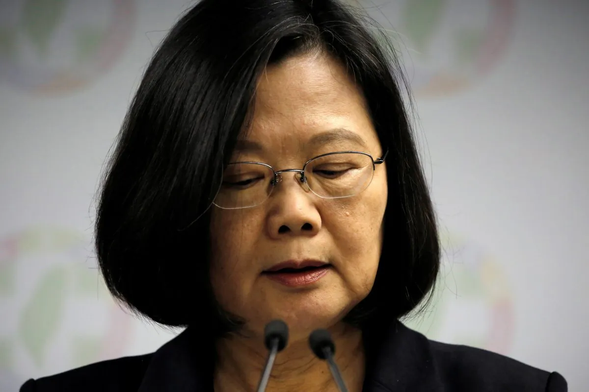 Taiwan President Tsai Ing-wen announces her resignation as chairwoman of the Democratic Progressive Party (DPP) after local elections in Taipei on Nov. 24, 2018. (Ann Wang/Reuters)