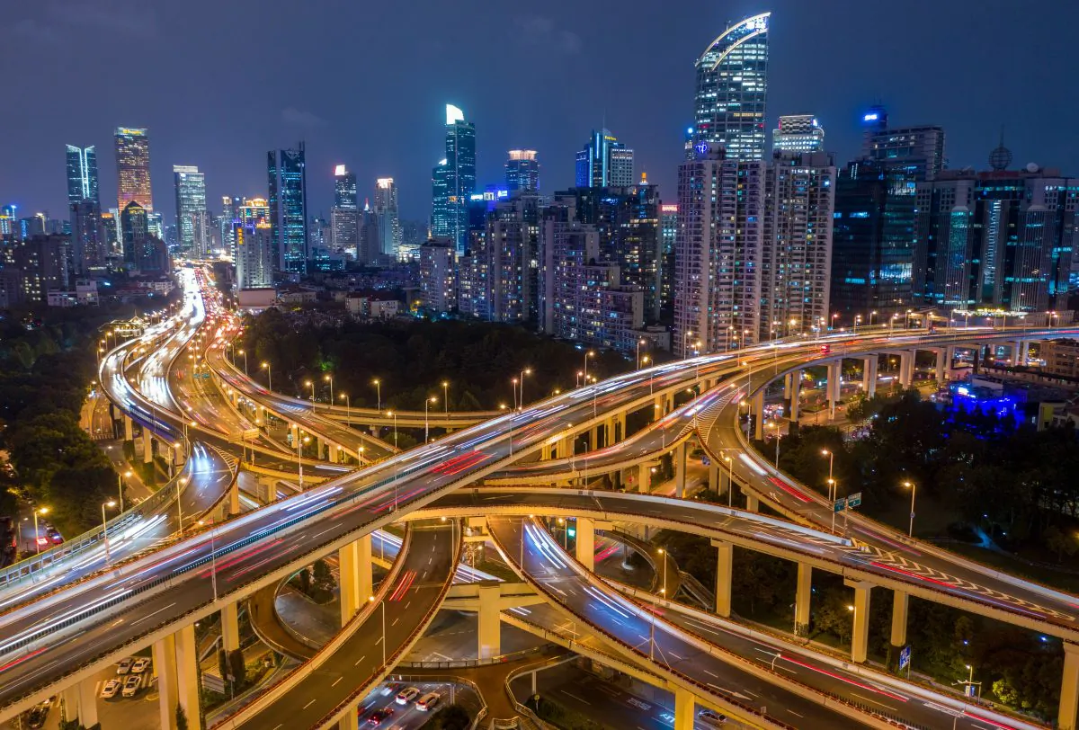 This aerial picture shows traffic on an elevated intersection in downtown Shanghai, China on Nov. 12, 2018. (Johannes Eisele/AFP/Getty Images)