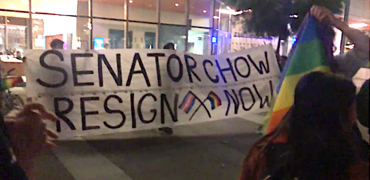 Protesters hold a big banner saying: “Senator Chow, Resign Now” in Berkeley, Calif., on Nov. 7, 2018. (Courtesy Isabella Chow)