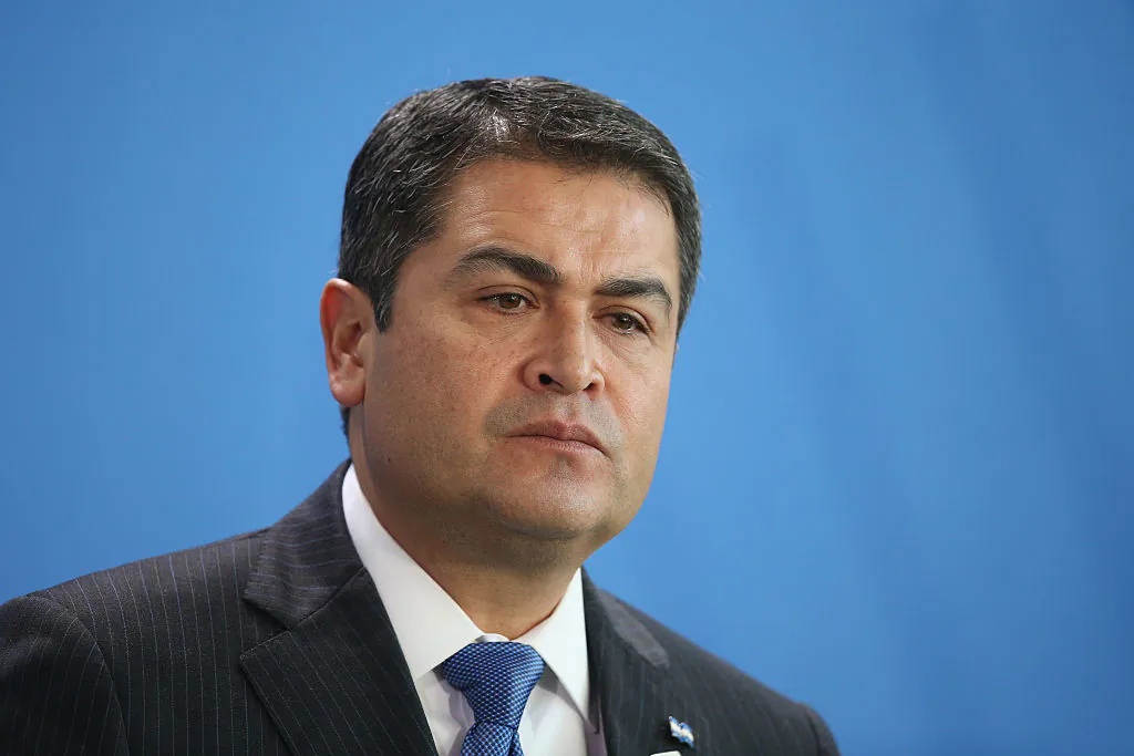 Honduran President Juan Orlando Hernandez speaks to the media with German Chancellor Angela Merkel (not pictured) following talks at the Chancellery in Berlin, Germany, on Oct. 27, 2015. (Photo by Sean Gallup/Getty Images)
