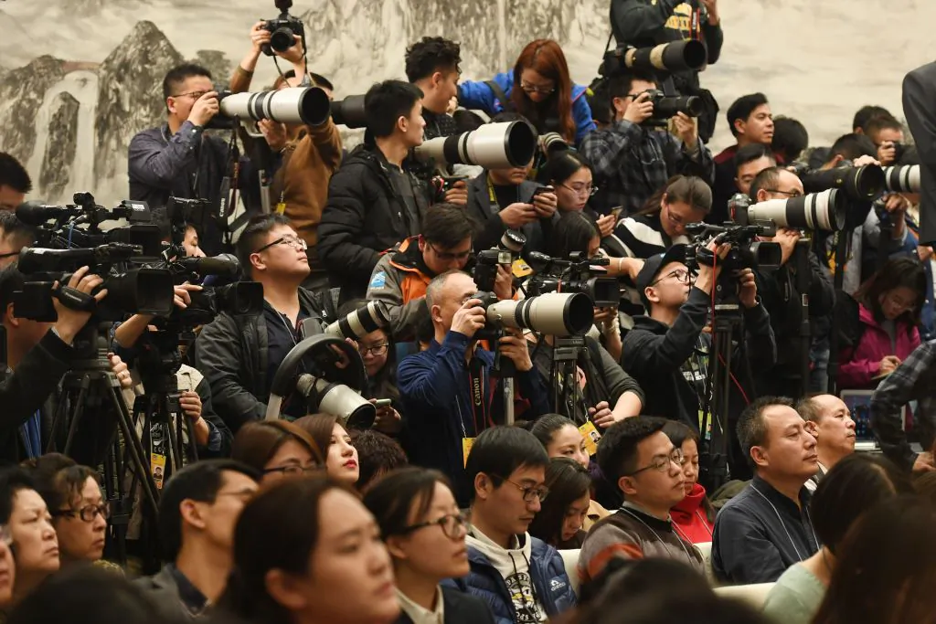 Journalists crowd a press conference for the Chinese People's Political Consultative Conference in the Great Hall of the People in Beijing on March 2, 2018. (Greg Baker/AFP/Getty Images)