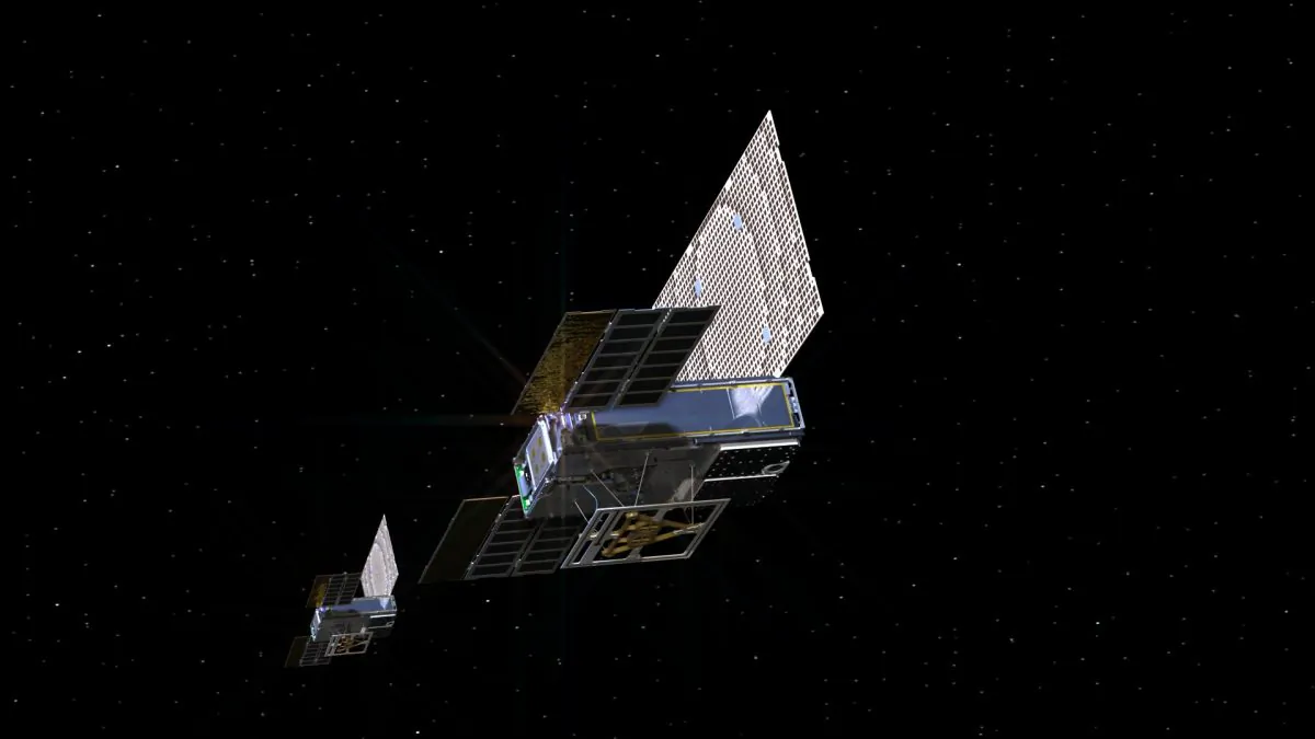 An artist's rendering of the twin Mars Cube One (MarCO) spacecraft as they fly through deep space. They are the first CubeSats attempting to travel to another planet and are designed to fly along behind NASA's InSight lander on its cruise to Mars to test relaying data about InSight's entry, descent, and landing back to Earth. (NASA/JPL-Caltech)