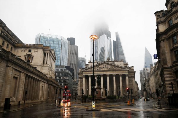 The Bank of England in London's financial district during rainy weather