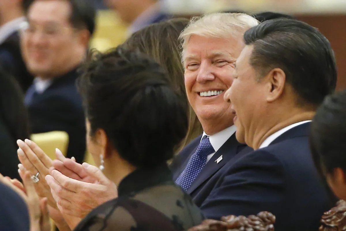 US President Donald Trump and China's President Xi Jinping (R) attend a state dinner at the Great Hall of the People in Beijing on November 9, 2017. (THOMAS PETER/AFP/Getty Images)