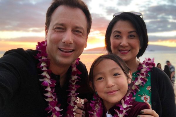 Chris Burrous is with his wife and daughter