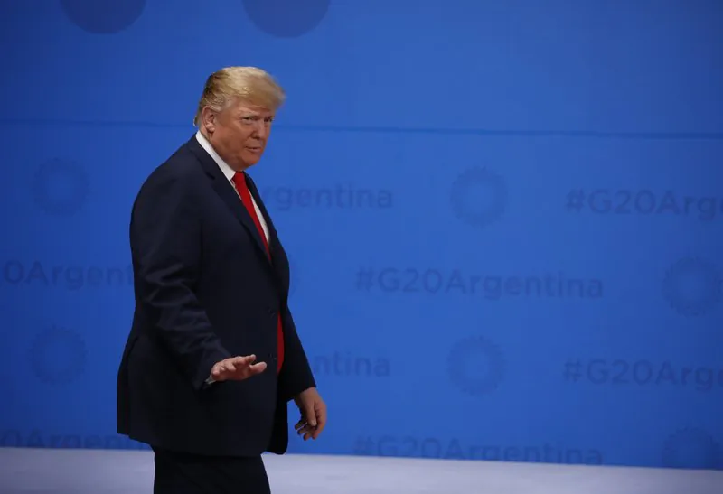 United States President Donald Trump arrives for the G20 Leader's Summit group photo inside the Costa Salguero Center in Buenos Aires, Argentina, on Nov. 30, 2018. (Andres Martinez Casares/Pool via AP)