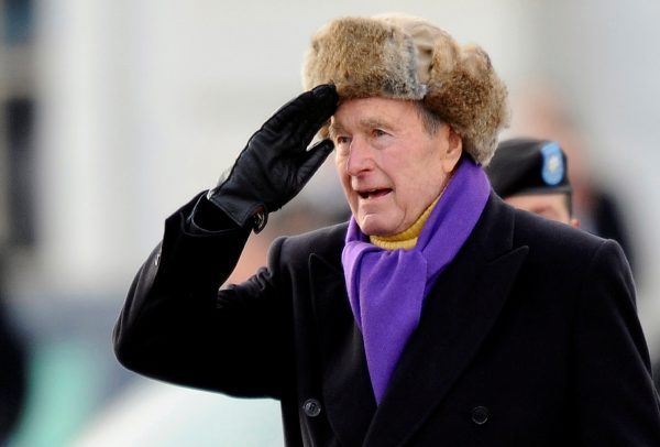 Former U.S. President George H.W. Bush salutes