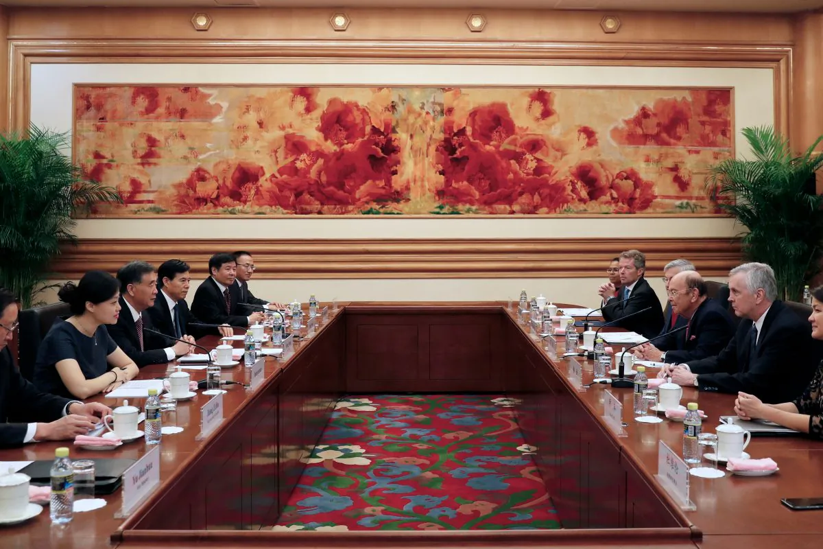 US Commerce Secretary Wilbur Ross (3rd R) and Chinese Vice Premier Wang Yang (3rd L) attend a bilateral meeting. The international world thought China central government could control all the country. But the fact maybe different. Sept. 25, 2017 in Beijing. (Andy Wong/AFP/Getty Images)