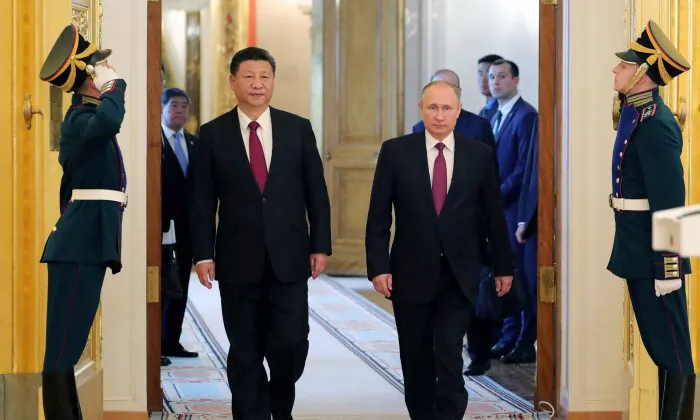 Russian President Vladimir Putin and Chinese leader Xi Jinping at the Kremlin in Moscow on July 4, 2017. (Mikhail Klimentiev/AFP/Getty Images)