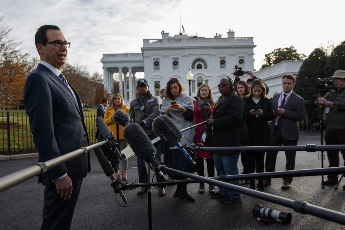 Treasury Secretary Steve Mnuchin talks with reporters about trade negotiations with China, at the White House in Washington DC on Dec. 3, 2018. (Evan Vucci/AP)