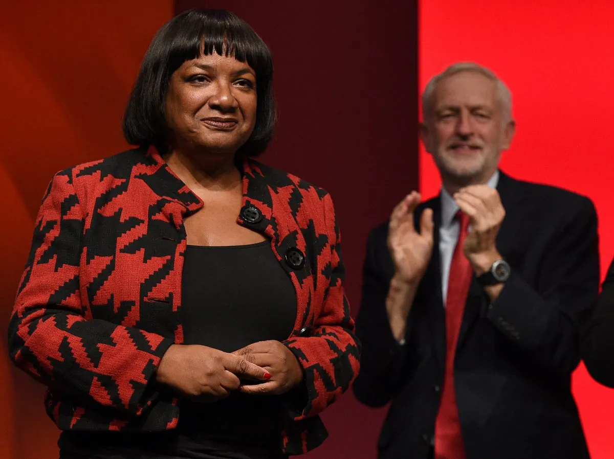 Britain's Labour Party leader Jeremy Corbyn (R) applauds Shadow Home Secretary Diane Abbott (L) after she addressed delegates on the third day of the Labour party conference in Liverpool, northwest England, on Sept. 25, 2018. Abbott spoke at the Congressional Progressive Caucus summit in March about socialist politics. (OLI SCARFF/AFP/Getty Images)