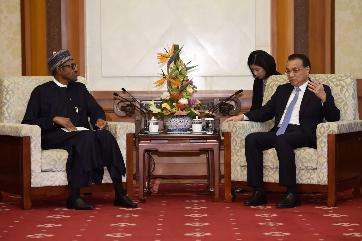 China's Premier Li Keqiang (R) talks to Nigeria's President Muhammadu Buhari during their meeting at the Diaoyutai State Guesthouse in Beijing on Sept. 5, 2018. (Parker Song/AFP/Getty Images)