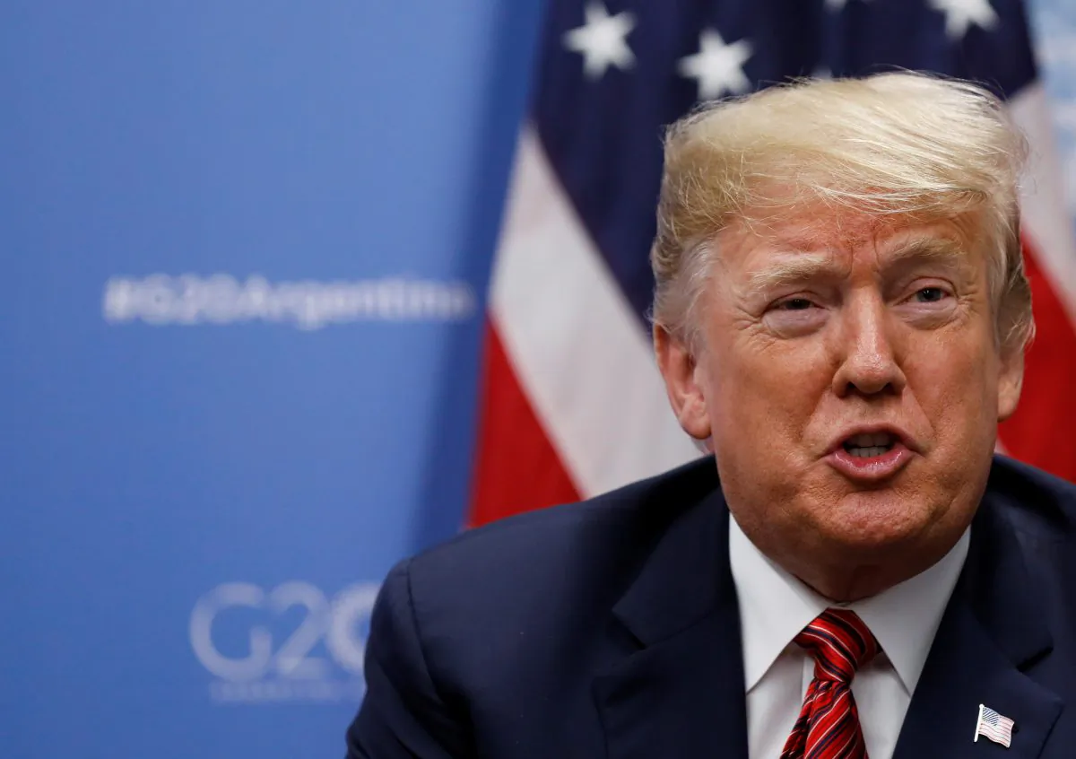U.S. President Donald Trump attends a meeting with German Chancellor Angela Merkel during the G20 leaders summit in Buenos Aires, Argentina on Dec. 1, 2018. (Kevin Lamarque/Reuters)