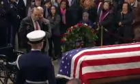 Bob Dole, 95, Is Helped out of Wheelchair to Salute Casket of George HW Bush