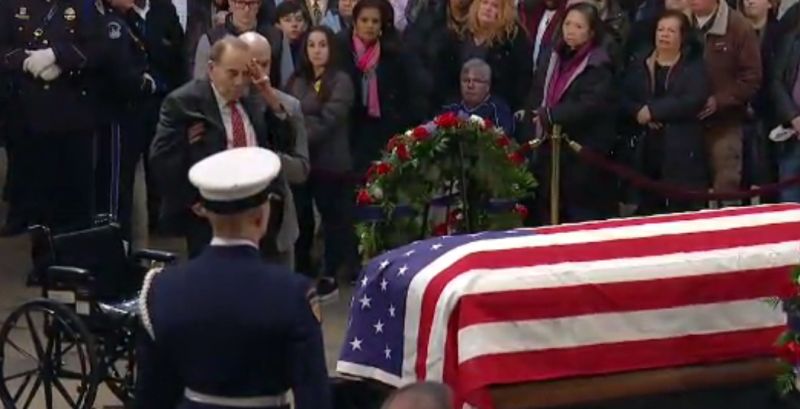 bob dole salutes casket of george hw bush