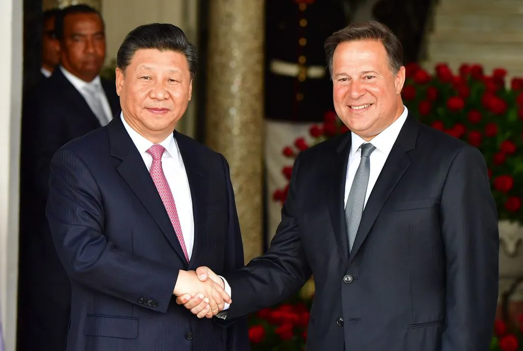 Panama's President Juan Carlos Varela (R) and Chinese leader Xi Jinping shake hands upon the latter's arrival at the presidential palace in Panama City, on Dec. 3, 2018. (Luis Acosta/AFP/Getty Images)