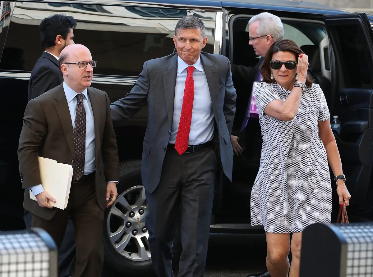 Michael Flynn (C), former national security adviser to President Donald Trump, arrives at the E. Barrett Prettyman Federal Courthouse in Washington on July 10, 2018. (Mark Wilson/Getty Images)
