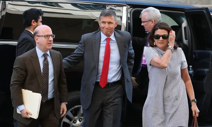 Michael Flynn (C), former national security adviser to President Donald Trump, arrives at the E. Barrett Prettyman Federal Courthouse in Washington on July 10, 2018. (Mark Wilson/Getty Images)
