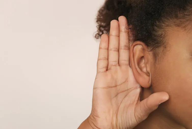 A stock photo shows a woman's ear (Africa Studio/Shutterstock)