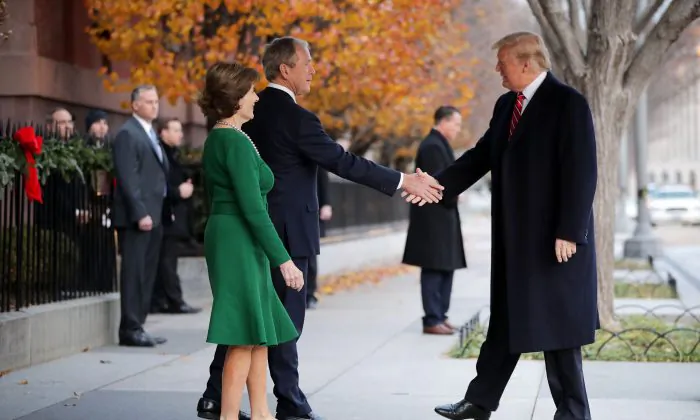Former First Lady Laura Bush and former President George W. Bush greet President Donald Trump outside of Blair House in Washington on Dec. 4, 2018. (Chip Somodevilla/Getty Images)