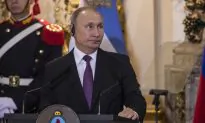 Russia Will Build Banned Missiles If US Quits Arms Treaty, Putin Says