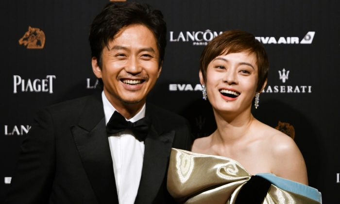 Chinese actor Deng Chao and actress Sun Li arrive on the red carpet of the 55th Golden Horse film awards, dubbed the Chinese 'Oscars', in Taipei on November 17, 2018. (SAM YEH/AFP/Getty Images)