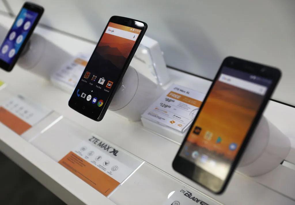Two cell phones manufactured by ZTE, China's No. 2 smartphone maker, are seen on a store shelf in Miami, Florida, on May 14, 2018. (Joe Raedle/Getty Images)