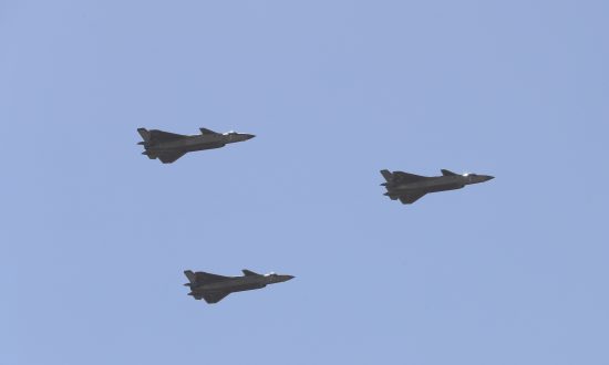 China’s Military Intends to ‘Defeat, Not Merely Compete’ With US, Report Says