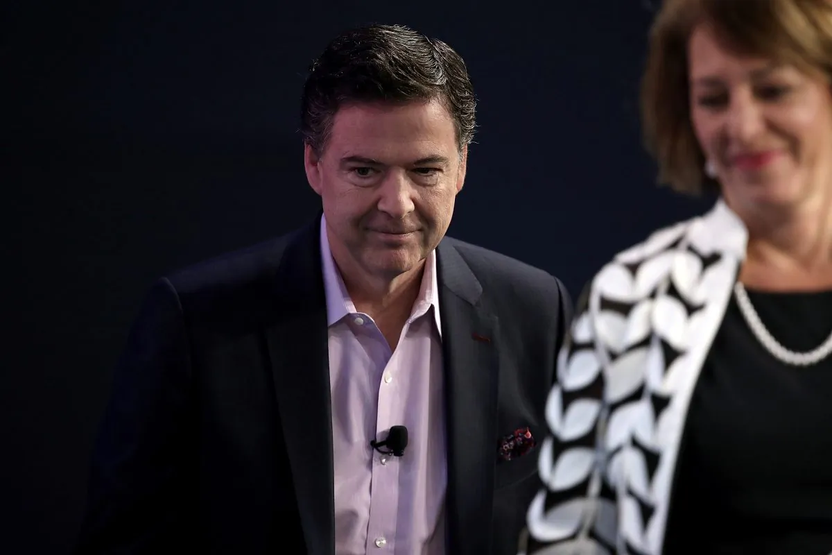 Former FBI director James Comey (L) arrives for an interview forum with investigative reporter Carol Leonnig at The Washington Post, on May 8, 2018 in Washington. Comey discussed his stormy tenure as head of the FBI during the forum. (Win McNamee/Getty Images)