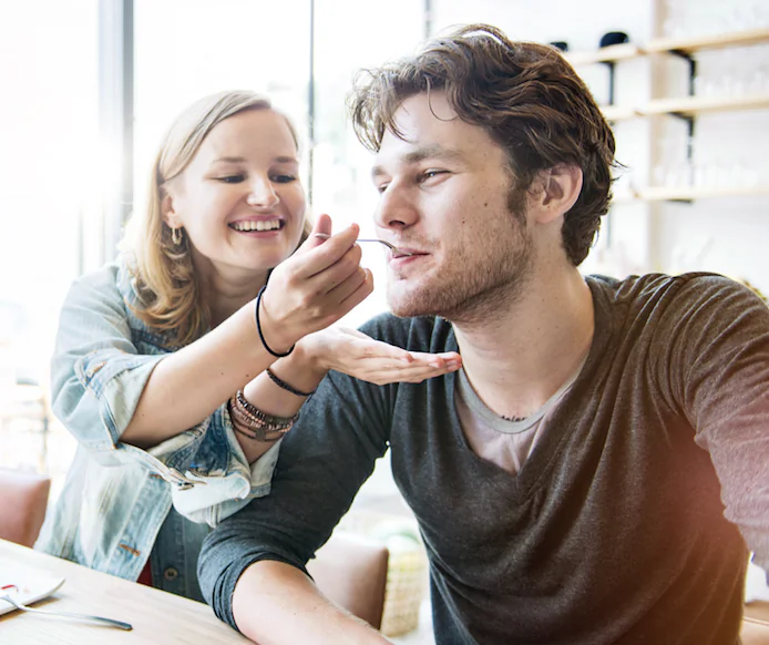Couple Dating Dessert Restaurant Eating Concept. (Shutterstock)
