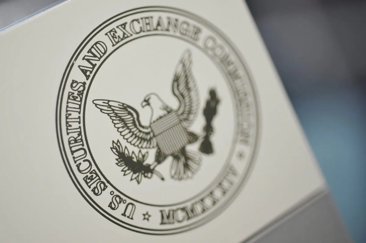 The U.S. Securities and Exchange Commission logo adorns an office door at the SEC headquarters in Washington, on June 24, 2011. (Jonathan Ernst/Reuters)