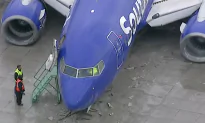 Plane Slides Off Runway at Hollywood Burbank Airport in Heavy Rains