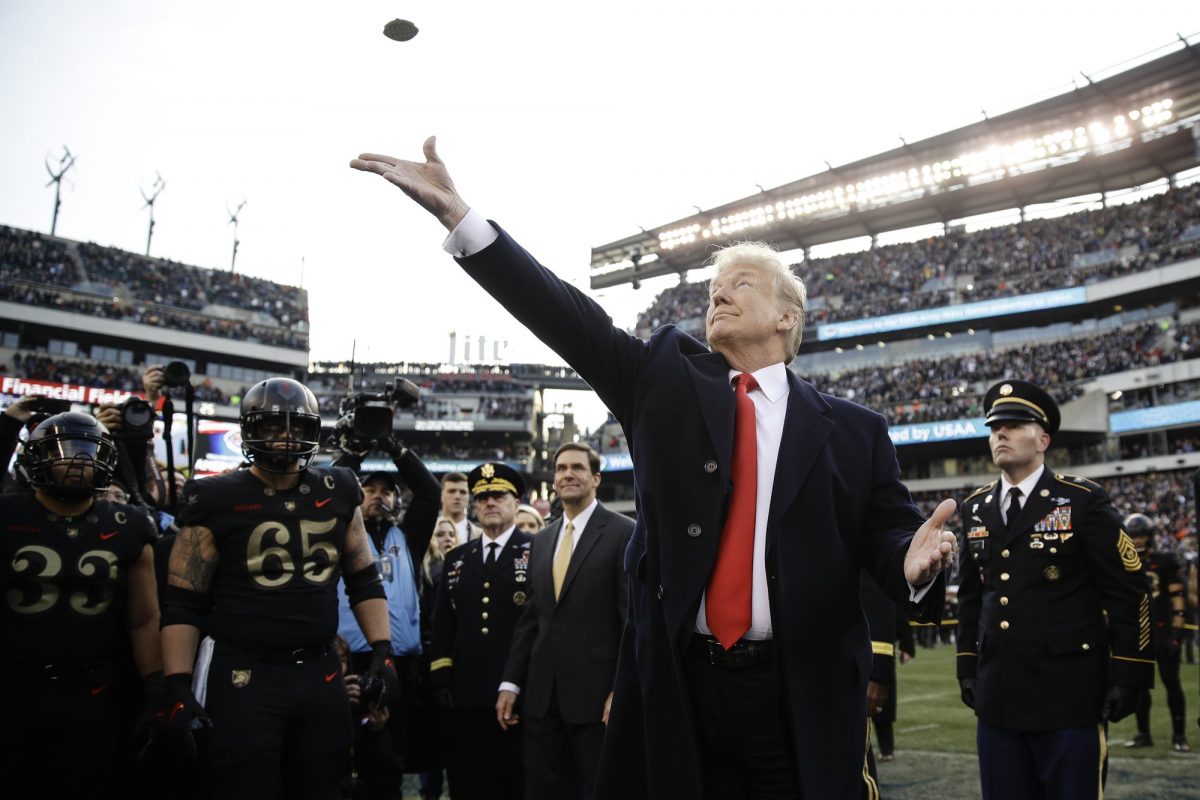 trump tosses da coin in da air