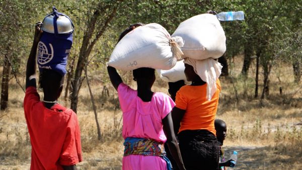 Women and girls getting food