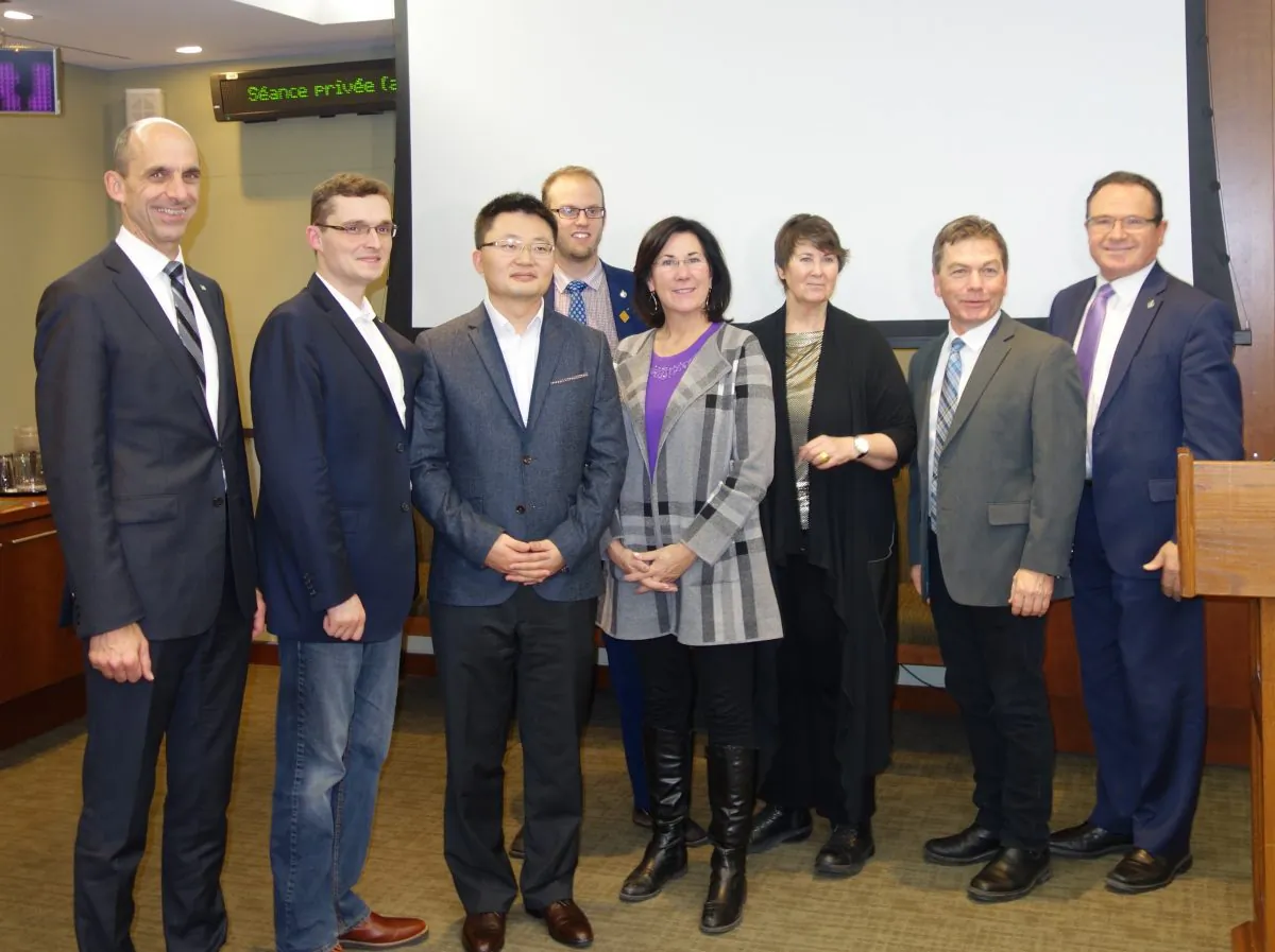 Co-hosts Senator Marilou McPhedran (3rd R), MP Cheryl Hardcastle (4th R), and MP Tom Kmiec (2nd L), along with attendees MP Steven Blaney (1st L), film producer and director Leon Lee (3rd L), MP Arnold Viersen (4th L), MP David Anderson (2nd R), and MP Harold Albrecht (1st R), at the screening of the award-winning documentary “Letter from Masanjia” on Parliament Hill in Ottawa on Dec. 5, 2018. (Grace Dai/The Epoch Times)