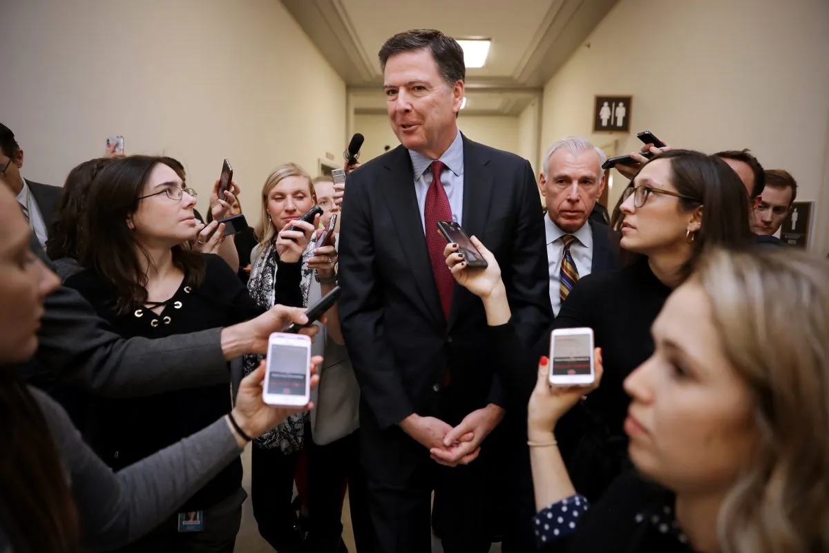 Former FBI Director James Comey (C) talks to reporters following a closed House Judiciary Committee meeting to hear his testimony, on Capitol Hill on Dec. 7, 2018. (Chip Somodevilla/Getty Images)