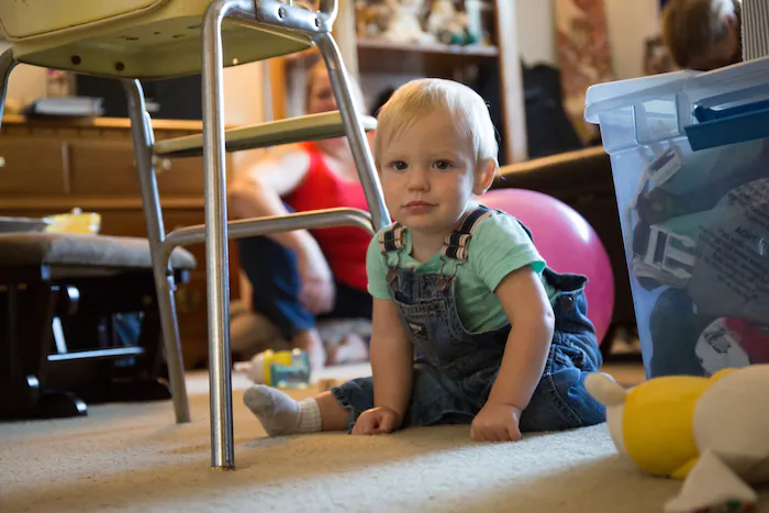 Adrian Veum plays at home. Nicole Veum says she's loving being his mom, and feels "reborn." (Adam Grossberg/KQED)