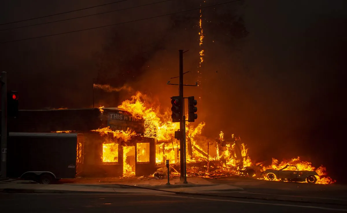 A store burns as the Camp fire tears through Paradise, Calif. on November 8, 2018. (Josh Edelson/AFP/Getty Images)