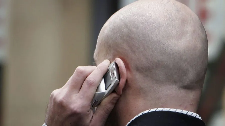 A man uses his cellphone in a file photo. (Christopher Furlong/Getty Images)